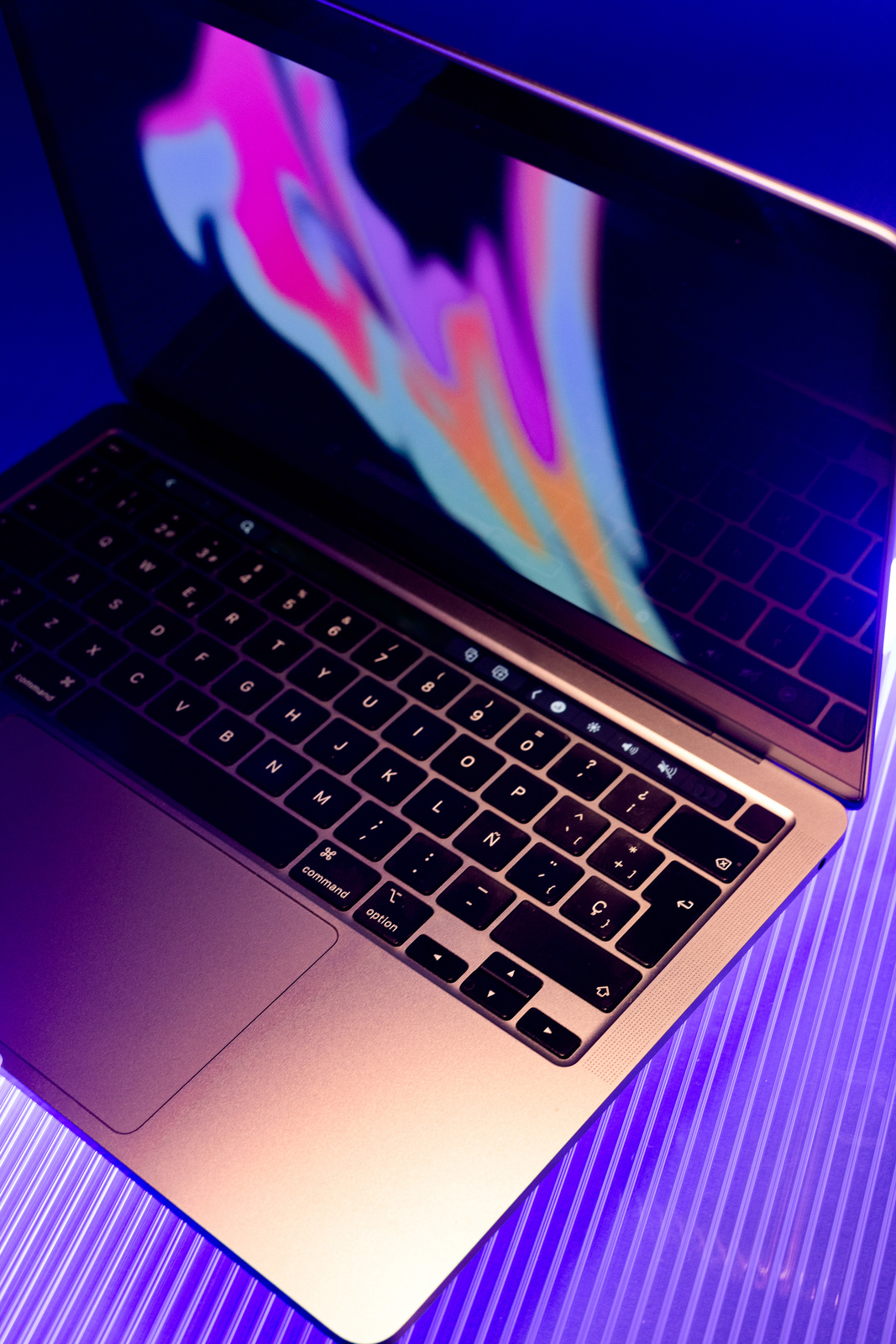 Tech Glow Laptop on Neon Lighted Surface